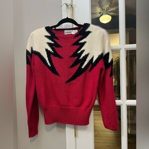 Fantastic vintage pink sweater with wing details on shoulders size Medium